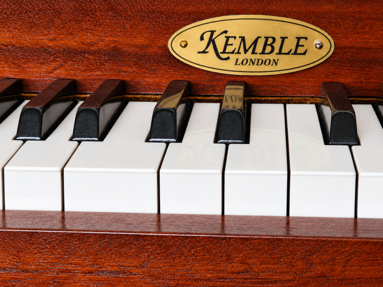 Kemble London piano badge close-up